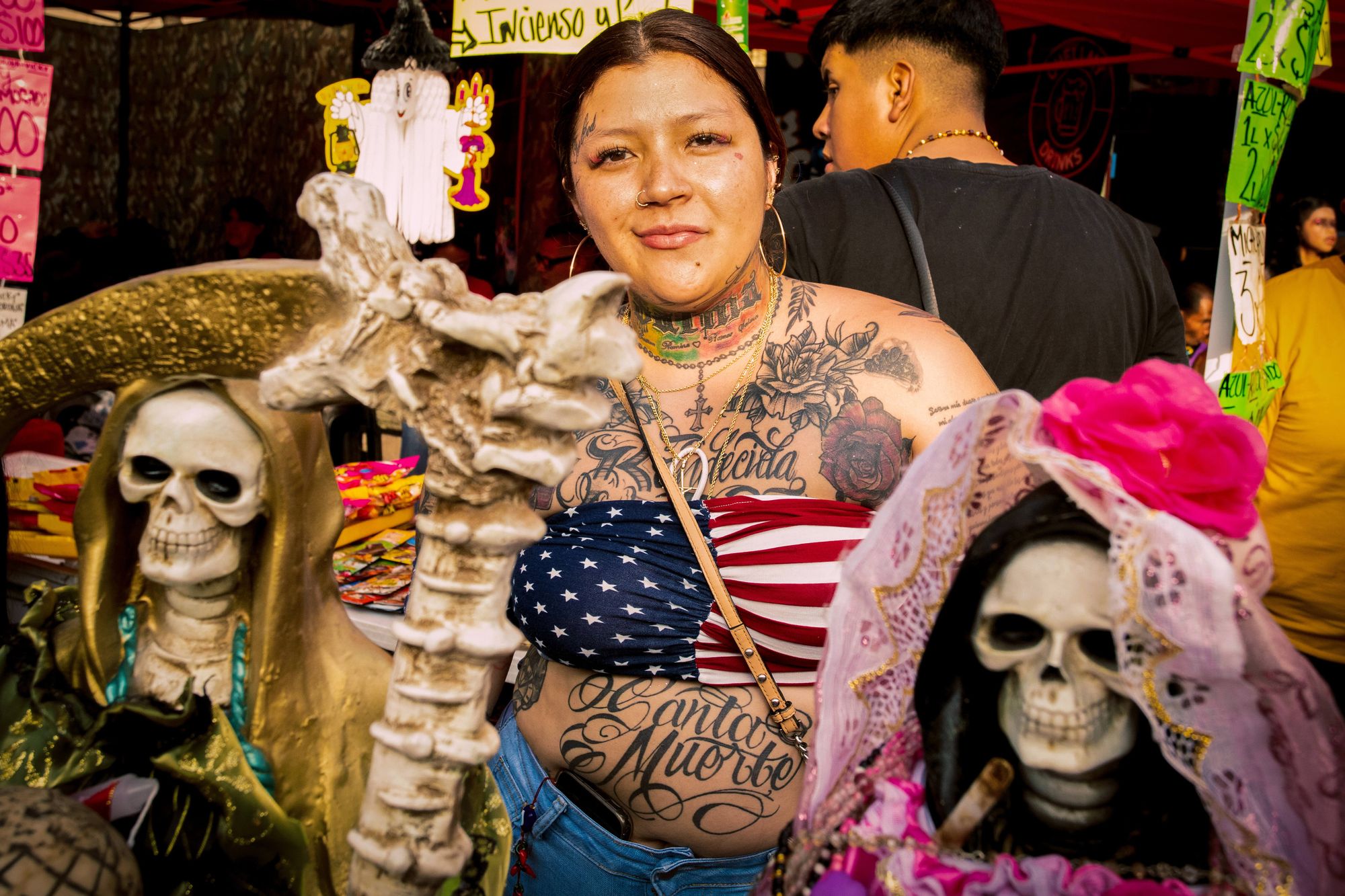 gangster looking grill at the santa muerte mass in tepito, mexico city