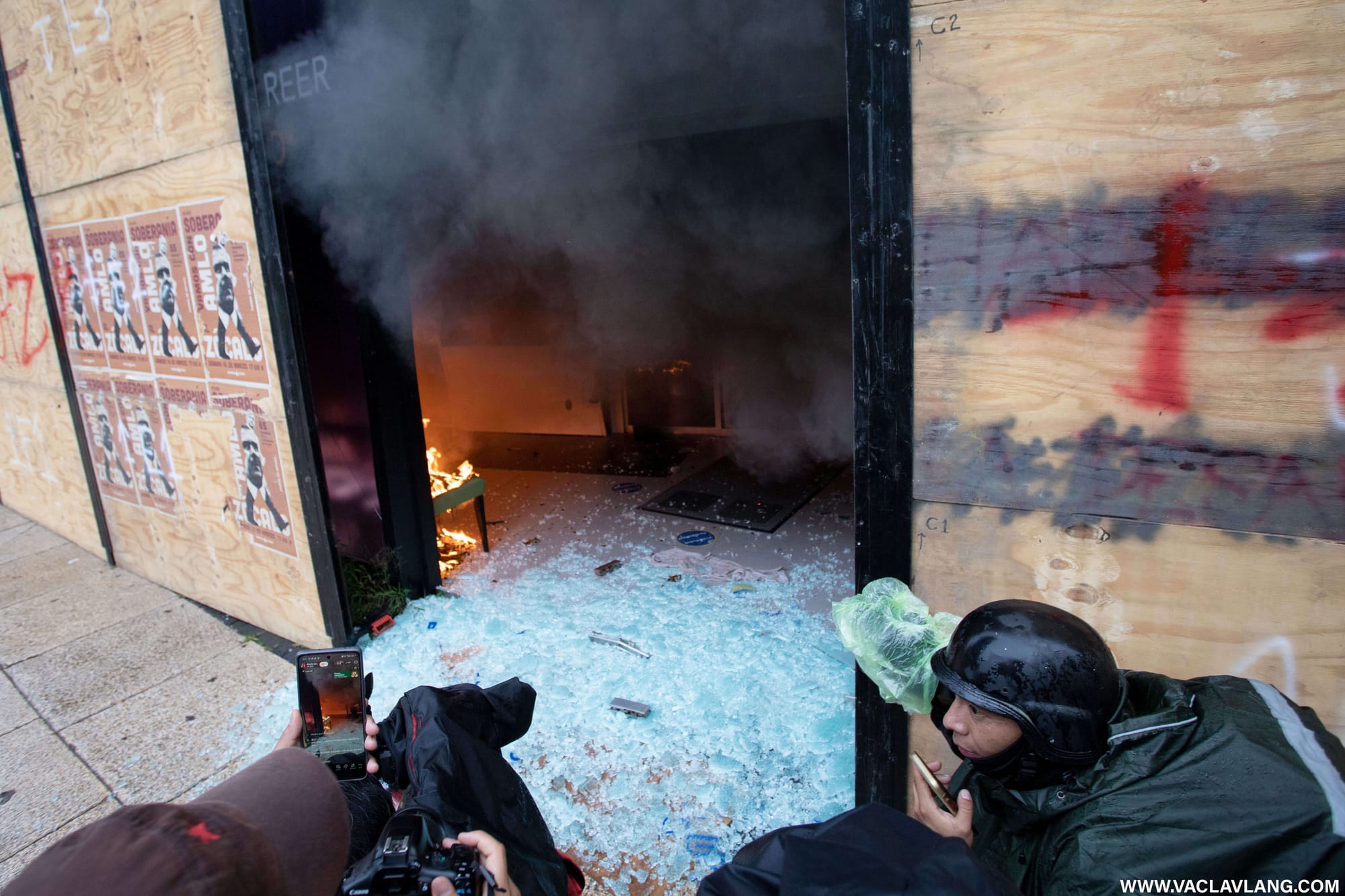 Journalists at one of the buildings which caught fire. (Photo: Václav Lang)